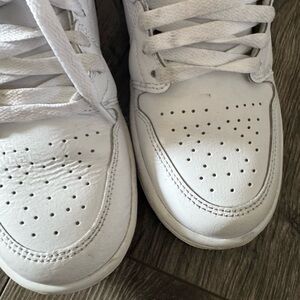 Nike White Low-Top Athletic Shoes with Perforations